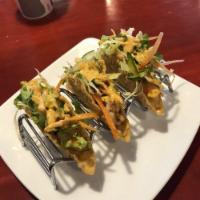 3 Pieces Wonton Tacos · Served with vinegrette mixed greens and topped with pho street secret sauce.