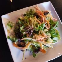 Cucumber Salad · Crab meat and thinly sliced cucumbers served on a bed of spring mix. Glazed with ponzu, swee...