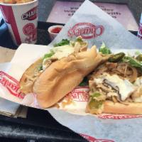 Chicken Philly Sub · Cooked ingredients include white chicken meat, onion, mushroom, green pepper, provolone chee...