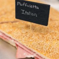 Italian Muffuletta · Mortadella, salami, porovolone.
