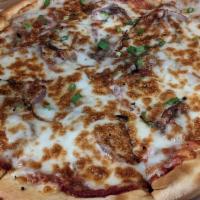 Bulgogi Pizza · Korean flavors and savory accents bring together this favorite Bulgogi pizza. Hand tossed go...