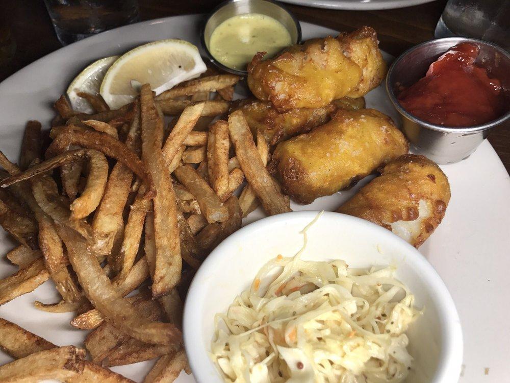 Fish and Chips · fried cod fish  in a beer batter served with french fries, tartar sauce and homemade coleslaw.