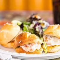 Chicken Parm Sliders · Four mini subs of breaded pounded chicken breast topped with marinara, Mozzarella and Parmig...