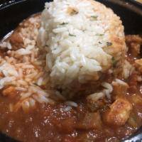 Shrimp Creole · Fresh shrimp cooked in a spicy sauce consisting of tomatoes, garlic and of course 