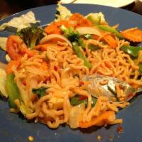 Spaghetti Kee Mao · Hot and spicy. Thai spaghetti noodles and a seafood combination prepared with chilies and a ...