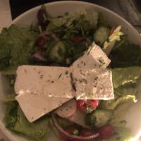 Greek Salad · Feta cheese, romaine, cucumber, tomato, red onion, fresh herbs, za'atar croutons, extra virg...