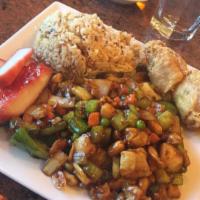 Kung Pao Chicken · Chicken stir fried with fresh onions, green peppers, carrots and peanuts in spicy sauce. Ser...