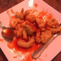 Sweet and Sour Chicken · Boneless chicken, dipped in a light batter and fried, served with sweet and sour sauce. Serv...