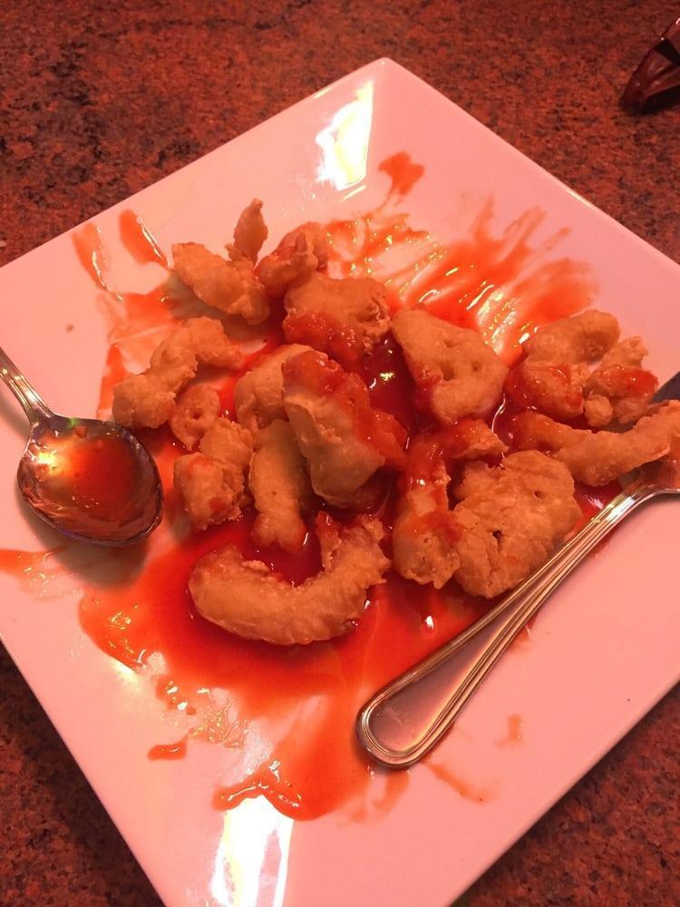 Sweet and Sour Chicken · Boneless chicken, dipped in a light batter and fried, served with sweet and sour sauce. Served with steamed rice.
