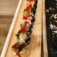 G - Dragon Roll · Eel on top of shrimp tempura, avocado, and crab.