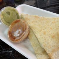 Cheese Quesadilla Only · Cooked tortilla that is filled with cheese and folded in half. 