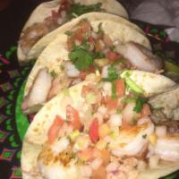 Shrimp Tacos · Your choice of grilled or fried shrimp. Served with chipotle lime mayo, coleslaw topped with...