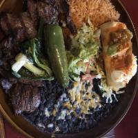 Carne Asada · Skirt streak broiled in a special way. Served with guacamole.