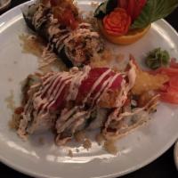 Red Dragon Roll · Shrimp tempura, cream cheese, avocado top with spicy tuna, shrimp tempura, tempura flake and...