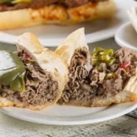 Italian Beef Sandwich · Tender sliced roast beef marinated in au jus.