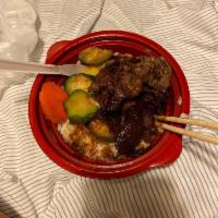 BBQ Beef Bowl · Includes steamed rice and steamed vegetables.