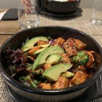 Bibimbap Escape Dinner · served with sauteed vegetables and organic fresh spring mix, English cucumber, red cabbage a...