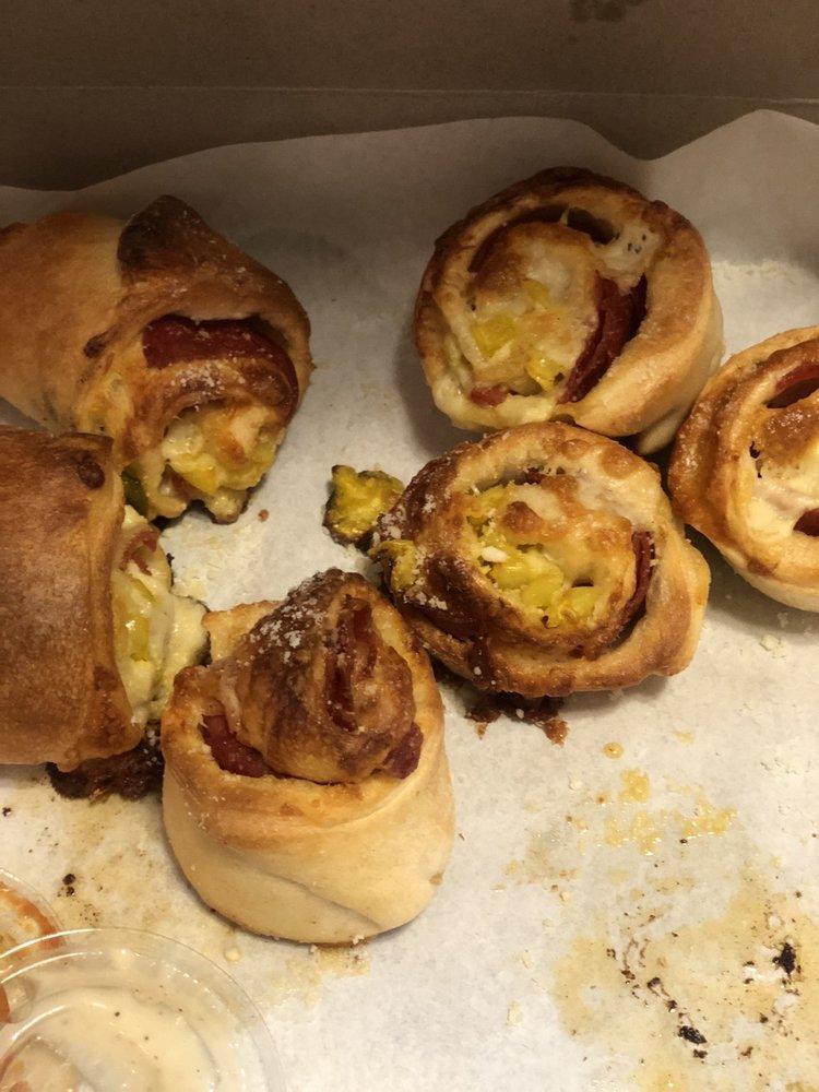 Pepperoni Pinwheels · Our homemade pizza dough stuffed and rolled with pepperoni, banana peppers and mozzarella cheese. Served with marinara dipping sauce.