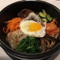 Bi Bim Bap · Five kinds of vegetables, beef and egg over steamed rice with red chili paste. Served with m...