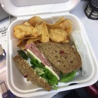 Roast Beef Sandwich · Made with lettuce, tomato, red onion, mayo and mustard. Served on your choice of bread with ...