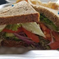 The Veggie Sandwich · Fresh greens, alfalfa sprouts, tomato, cucumber, avocado, red onion and tomato. Served on yo...
