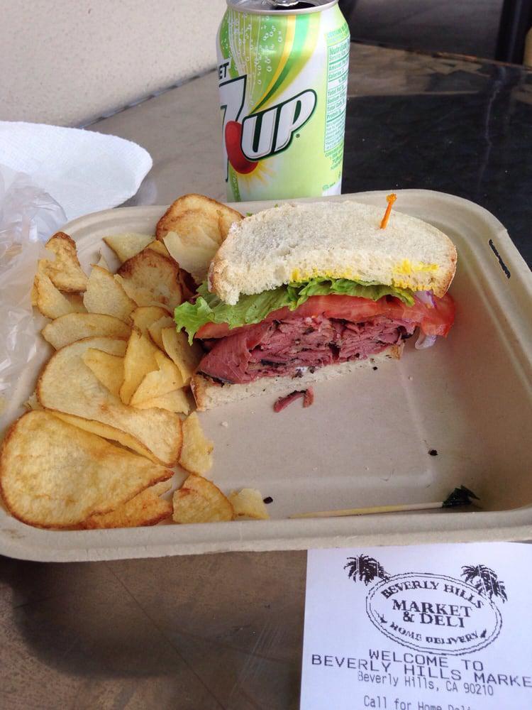Pastrami Sandwich · Made with lettuce, tomato, red onion, mayo and mustard. Served on your choice of bread with a side of homemade potato chips and a pickle.