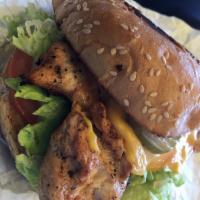 Grilled Chicken · Crispy or grilled chicken, cheese, lettuce, pickles, tomatoes, mayo.