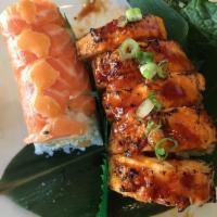 Bethany Roll · Shrimp tempura, crab salad and avocado. Topped with seared salmon and spicy crab salad. Topp...