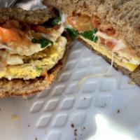Wake-up Sandwich · Egg, cheese, roasted tomato, pesto and spinach.