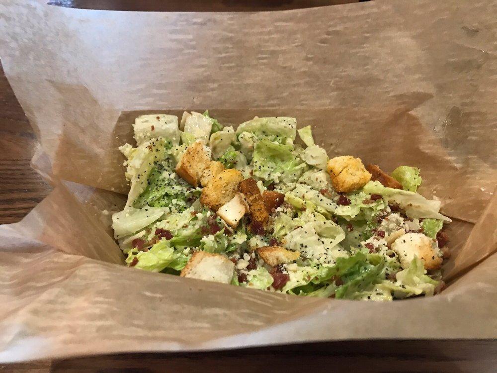 Caesar Salad · Romaine, Caesar dressing, Parmigiano Reggiano, crispy bacon and croutons. Add chicken for an additional charge.