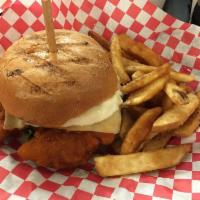 Buffalo Bill · Tommy skipped the burger on this one, crispy chicken smothered in Buffalo sauce topped with ...