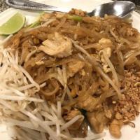 Pad Thai · Rice noodles, stir-fried with meat, egg, green onion, bean sprouts and peanut.