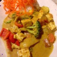 Yellow Curry · Yellow curry paste and coconut milk, potato, carrot and onion.