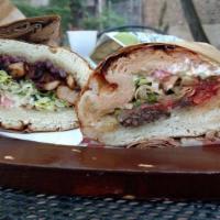 Vegan Sumac Chicken Sandwich · Vegan chicken roasted with red onions, olive oil and tangy Mediterranean sumac spice. Topped...