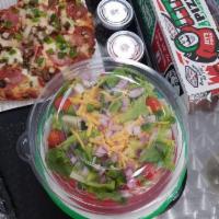 Garden Salad · Lettuce, cheddar cheese, grape tomatoes, red onions, green peppers and black olives.