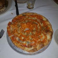 Buffalo Chicken Pizza · Mozzarella, crumbled blue cheese, light pizza sauce, fried chicken, Buffalo sauce, scallions.