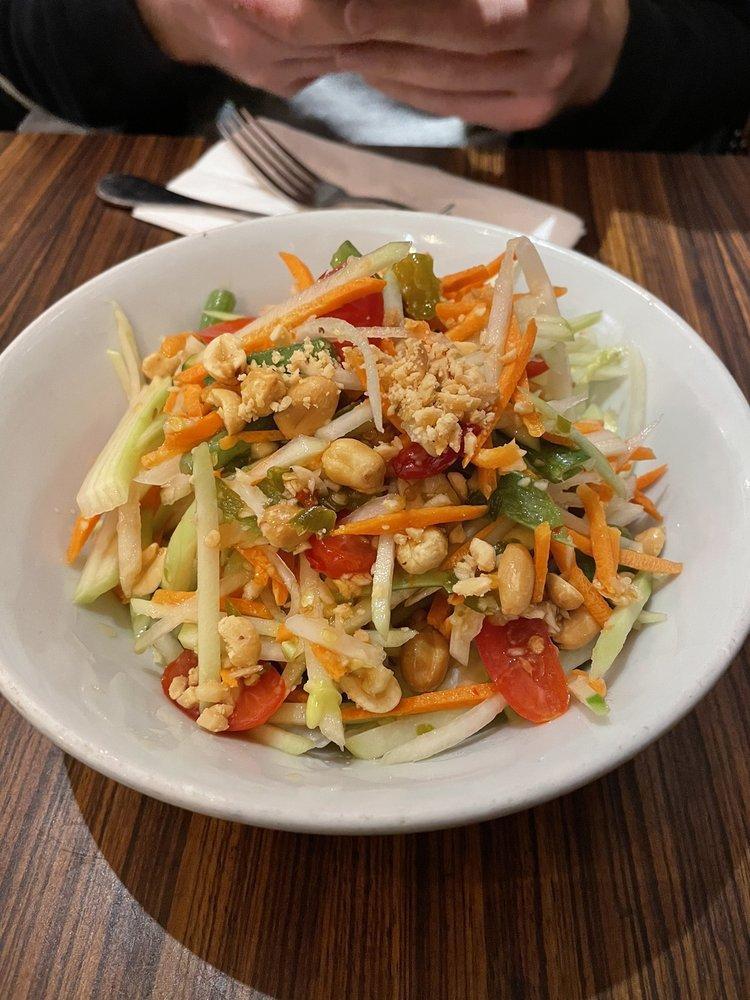 Papaya Salad · Cherry tomatoes, string beans, carrots, and roasted peanuts in chili-lime dressing. Spicy.