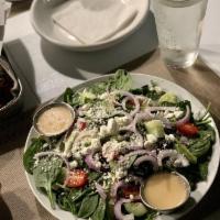 Spinach Salad · Spinach, black olives, goat cheese, avocado, red onions, tomatoes, cucumbers and apple cider...