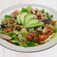 Cobb Salad · Charbroiled chicken breast, Romaine and Spring Mix, tomato, bacon, avocado, Bleu cheese crum...