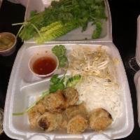 Vietnamese Egg Rolls · Served with vermicelli, lettuce plate, and sweet & sour sauce.