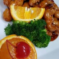 Orange Chicken · Fried golden brown chicken tossed in spicy orange sauce. Served with broccoli. Served with r...