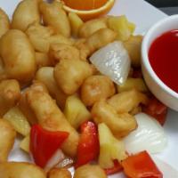Sweet and Sour Chicken · Onion, bell peppers, pineapple, sweet and sour sauce on the side. Served with rice.