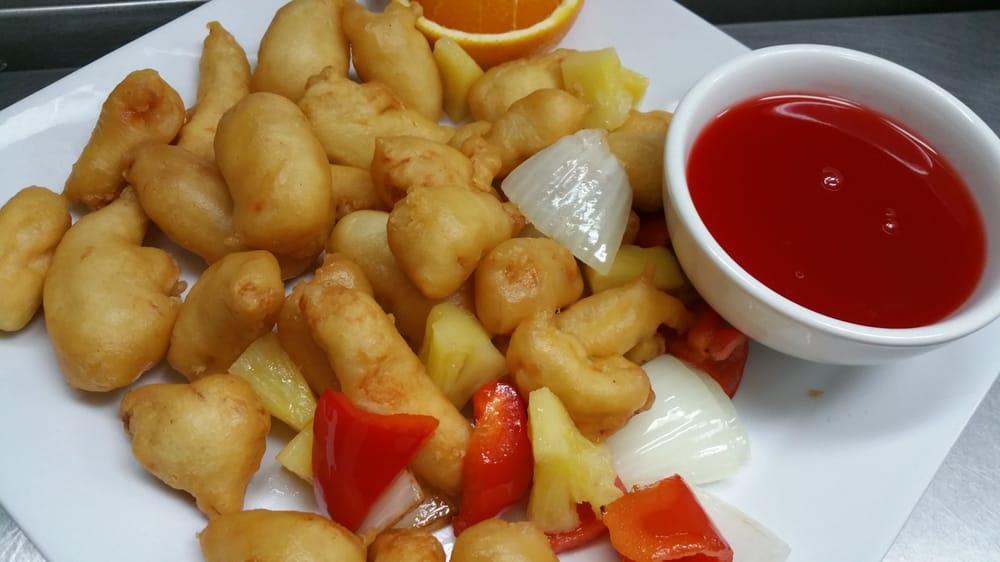 Sweet and Sour Chicken · Onion, bell peppers, pineapple, sweet and sour sauce on the side. Served with rice.