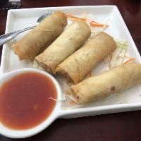 Spring Roll · Rice paper or crispy dough filled with shredded vegetables. 