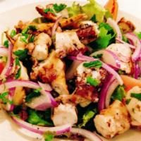 Char Grilled Octopus Salad · Tossed with garlic, lemon juice and vinegar. 