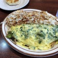 Veggie Omelette · Made with mushrooms, onions, green peppers, tomatoes, broccoli and Swiss cheese.