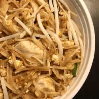 Pad Thai · Sauteed thin rice noodles with egg, bean sprouts, scallion and crushed peanuts in a tamarind...