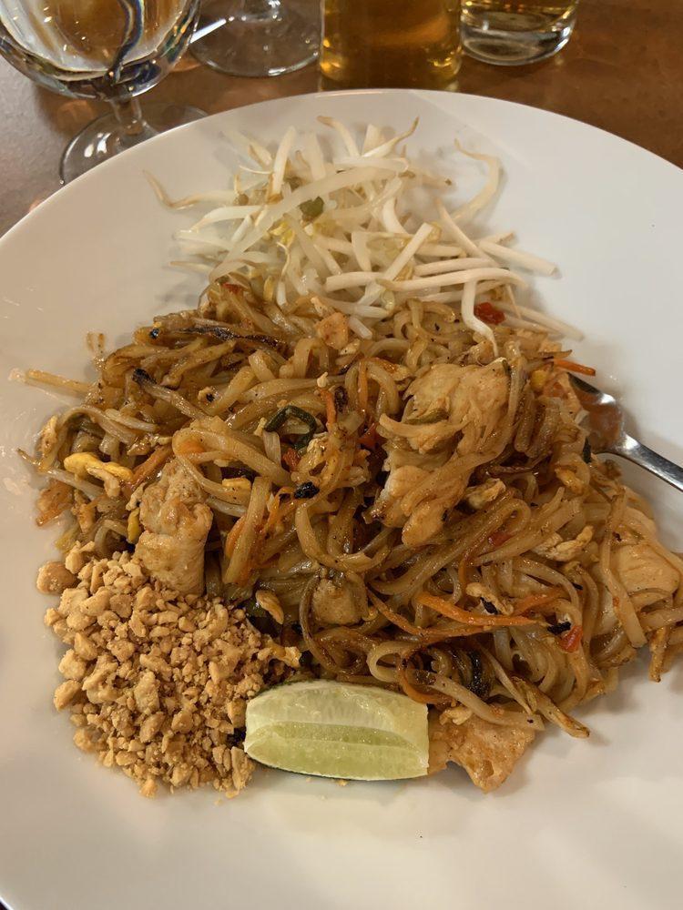 Pad Thai · Thailand's famou pan-fried noodles with egg in tamarind sauce with bean sprouts and carrots,served with ground peanuts and a lime wedge.