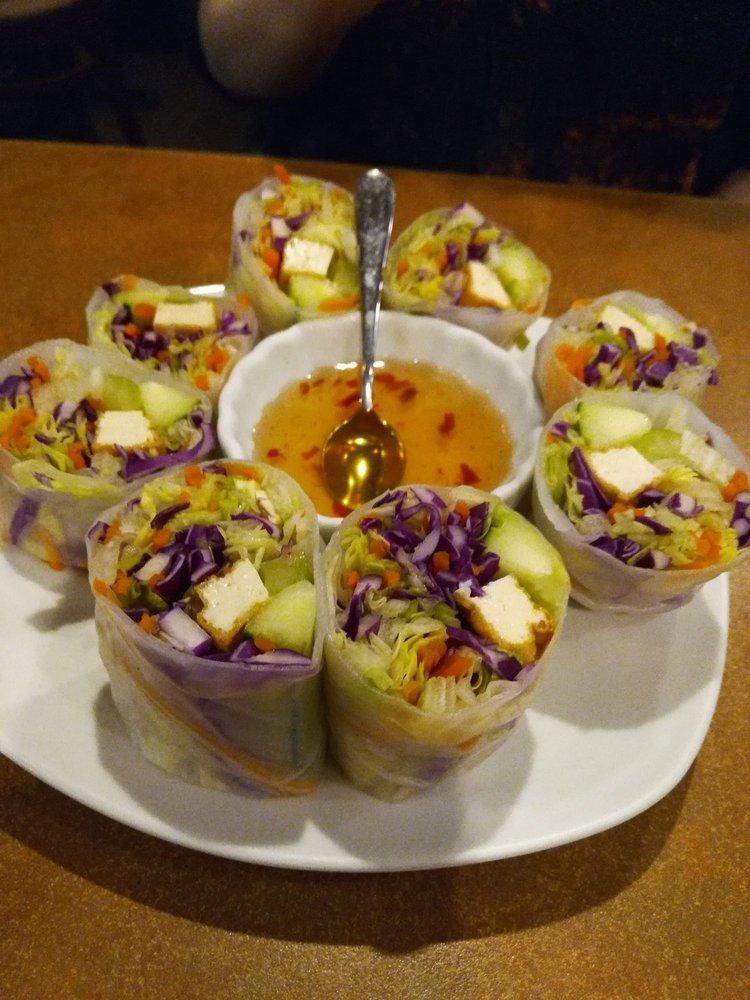 Summer Rolls · Hand-rolled soft rice paper stuffed with fresh iceberg lettuce, tofu, cucumber, carrot and cilantro, served with sweet and sour dipping sauce.