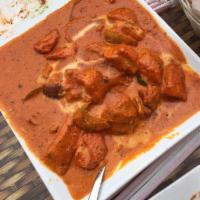 Butter Chicken · Chicken cooked with tomato, onion, butter and spices.